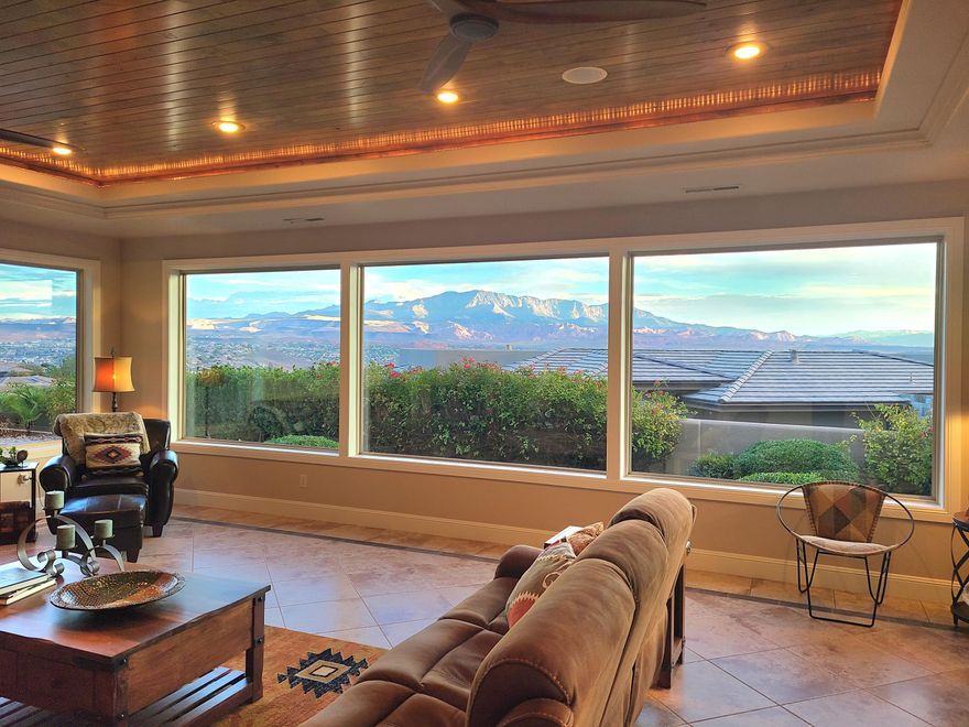 Beautifully crafted & recently updated, a spectacular, sprawling Stone Cliff property is ready for its new owners. 4 lovely bedrooms, 1 of which is an attached private casita, 5 baths, w/a separate dedicated office, grand kitchen w/dining area off of the lovely patio w/ outdoor kitchen adjacent to the newly renovated sparkling pool & spa overlooking Southern Utah's sweeping vistas. A large motor court & oversize triple garage provide ample off-street parking. Remember the incredible resort-like amenities that come w/ living in St. George's premier guarded & gated neighborhood. Live high on a secure plateau ridge just minutes from dining, shopping, Intermountain Medical Ctr, historic downtown St. George & the regional airport make this home a wonderful choice.
Schedule a private tour to