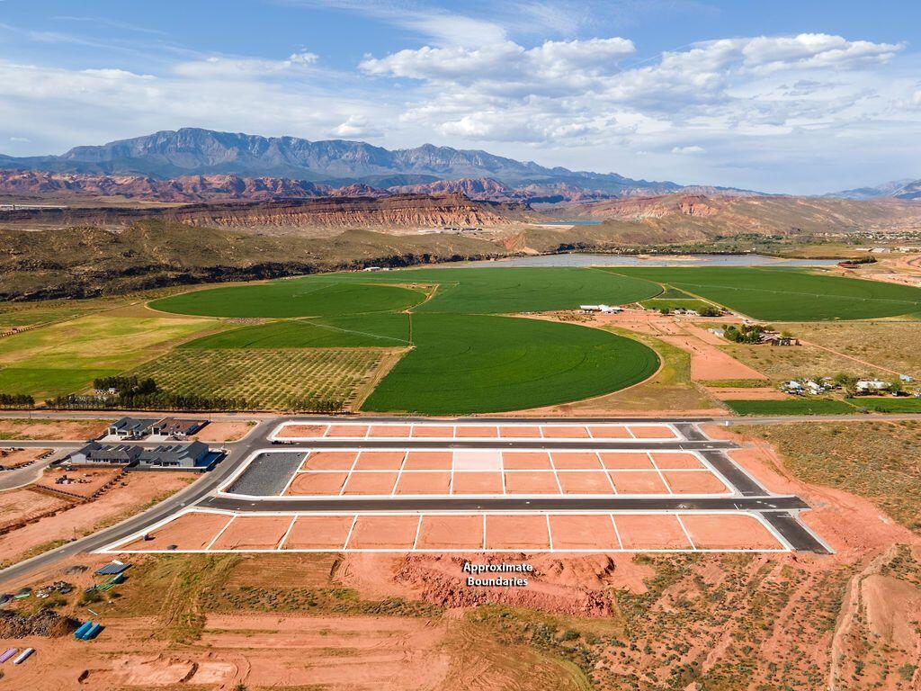 Lot 14 interior lot.  Pad ready, fully compacted and ready for your new home just down the road from the iconic Sand Dunes and Sand Hollow Reservoir.  All builders welcome.  Sand Hollow Village is a new subdivision tucked away among the orchards of Pecan Valley.