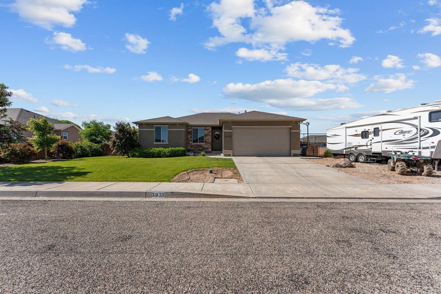 Spacious 6-Bedroom Family Home with Sport Court, RV Parking & Modern Upgrades !! Welcome to this stunning 6-bedroom, 3-bathroom home, perfectly designed for comfort, functionality, and fun. Situated on a beautifully landscaped lot, this property offers exceptional indoor and outdoor living with thoughtful upgrades throughout. Step inside to an open-concept living space featuring granite counter tops, updated lighting, and an inviting layout ideal for both entertaining and everyday life. The well-appointed kitchen opens to a large dining area and flows seamlessly into the main living room. Downstairs, you'll find a spacious basement family room—perfect for movie nights, game time, or multi-generational living. Outside is where this home truly shines. The fully fenced and well-lit backyard includes a multi-use sport court featuring basketball, pickle ball, volleyball, and even hopscotch offering hours of recreation for all ages. There's also dedicated RV parking, a rare and valuable feature for outdoor enthusiasts. Additional highlights include a laundry room with storage, low-maintenance landscaping, and curb appeal. Located in a desirable neighborhood close to schools, parks, and shopping, this home has it all - space, style, and endless possibilities.