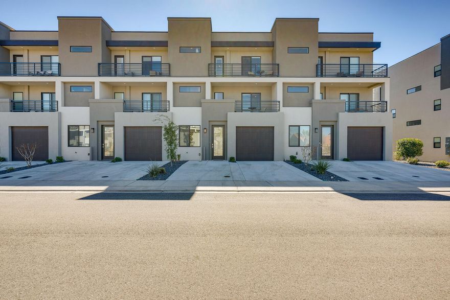 Fractional ownership opportunity - 1/8 share. Experience affordable luxury with this beautifully furnished 5-bedroom, 4.5-bath townhome, offering over 44 days of personal use each year. Enjoy the perks of vacation homeownership at a fraction of the cost, with professional management ensuring a seamless experience. Nestled in the heart of St. George, this elegant retreat delivers unforgettable getaways in a community designed for relaxation and fun. Take advantage of family-friendly amenities including a resort-style pool, splash pad, and rejuvenating hot tub—your perfect ''home base'' away from home.