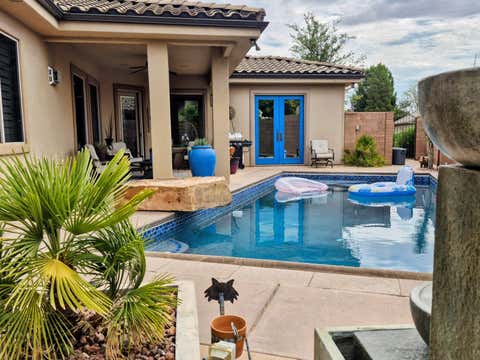 Photo of 754 SWISS HAVEN CIR, Santa Clara, UT 84765 (MLS # 26-274174)