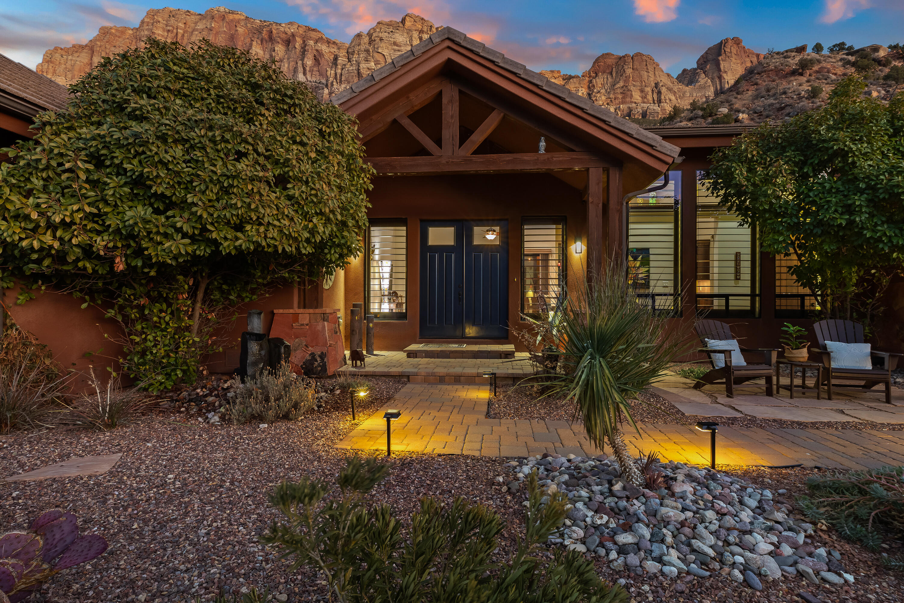 Experience the unparalleled beauty of Zion National Park from every part of this exceptional home in Canyon Springs, Springdale's premier neighborhood. Thoughtfully designed with a perfect floor plan, this craftsman-style residence features real wood floors and breathtaking views  and a setting that offers both privacy and tranquility. View the sun set on ''The Watchman'' which glows bright red/orange each night as the night sky arrives. Or watch a sunrise on ''West Temple'' from the comfort of your front patio. It is a rare opportunity to own a home in this sought-after location—don't miss your chance to make it yours! Contact us today for more details