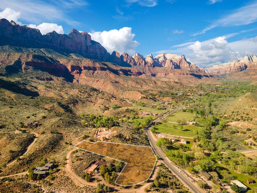 Welcome to a slice of paradise just a stone's throw away from the awe-inspiring Zion National Park! Nestled in the heart of Springdale, Utah, this approximately 2.1-acre gem offers an elevated living experience that's as unique as it is enchanting.
Prepare to be swept off your feet by the sheer magnificence of this extraordinary property. With 360-degree views that could rival even the most picturesque postcards, it's not just a piece of land... it's an invitation to embark on a journey of soul-stirring inspiration.
Picture yourself waking up to the gentle hues of a Utah sunrise, painting the sky with hues of gold and pink. And as the day comes to a close, indulge in the spectacle of the sunset, casting its warm embrace over the rugged terrain of this famous landscape. But it's not just about the views, this haven offers a lifestyle like no other. With hiking, biking, and year-round adventures right at your doorstep, every day is an opportunity for new discoveries and cherished memories. And when it's time to unwind, immerse yourself in the tranquility of native plants, under a canopy of dark night skies that seem to whisper tales of adventure.
Convenience meets seclusion on a private road just a hop, skip, and a jump away from the Zion Canyon Shuttle line. And with utilities readily available on Kinesava Drive, your dream of building a custom retreat is closer than ever.
Whether you're dreaming of a cozy hideaway or a luxurious escape, this property offers vistas that stretch as far as the eye can see overlooking Zion Canyon, the Virgin River Valley, and Parunaweep Canyon. It's more than just a piece of land, it's an opportunity to create your very own sanctuary amidst the majestic landscapes of Utah. Don't let this chance slip through your fingers! House plans and additional reports available for review.