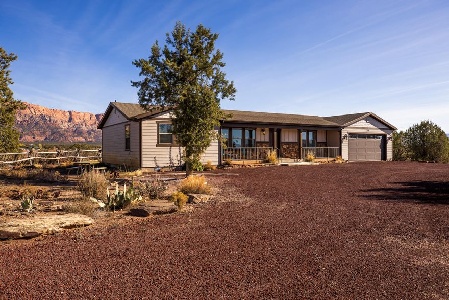 Secluded 20-acre property in Apple Valley featuring a 2019-built 3 bed, 3 bath home with 1,577 sq ft and an 883 sq ft 2-car garage. Property includes 3 acre-feet of water rights plus an existing well producing approx. 50 GPM (unmetered). Mostly electric home with heat pump, electric water heater, and propane fireplace. Full RV hookups on site. Approximately 17 acres sheep-fenced with full perimeter fencing and gated access. Includes a 49,000-gallon fire protection water tank. Zoned Agricultural. Property currently supports one primary residence plus potential for an accessory dwelling per town ordinance. Based on current zoning and surrounding land use, a future split into two approx. 10-acre parcels may be possible, subject to town approvals, water requirements, and road standards. Access via existing dirt/gravel roads. Buyer to verify all zoning, subdivision, and development potential.