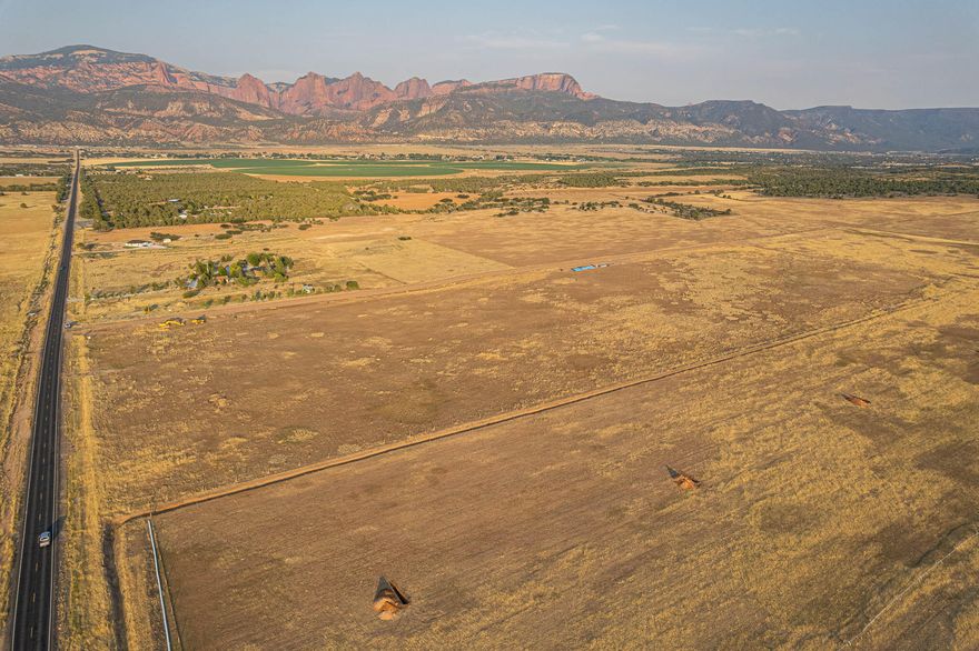 Tucked into one of Southern Utah's most stunning valleys, this rare 6-lot subdivision offers spacious parcels ranging from 5 to 6 acres each—perfectly positioned to take in breathtaking views of both Kolob Canyon and Pine Valley Mountain. Whether you're looking to build your dream home or invest in a piece of this peaceful paradise, these lots offer the perfect blend of space, beauty, and convenience.
Each lot is gently nestled into the landscape, offering a serene, private feel while still being part of a thoughtfully designed neighborhood. The setting is truly one-of-a-kind—surrounded by wide-open skies, incredible sunsets, and mountain backdrops in every direction.
Utilities are already in the street, making your build process easier and more affordable.