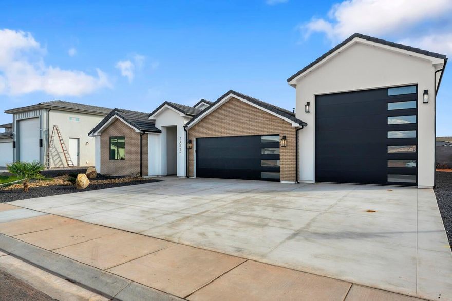 ~58' RV GARAGE SAND HOLLOW~ 360 Degree Landscaping Included! This single level Big Rock Homes home is in the sought-after Sand Hollow Village.

 One of the home's standout features is the massive 58-FOOT DEEP RV GARAGE. Inside, you'll find an open-concept layout with LUXURY FINISHES. REAR LANDSCAPING INCLUDING! 

4 security cameras are wired through out the exterior of the home. Home is prewired for electronic blinds.

- Ask about lender incentives if desired!

Just minutes from Sand Hollow Reservoir, Sand Hollow Golf Course, the sand dunes, and Zion National Park, you're surrounded by year-round adventure. Additional rear landscaping packages available. Contact listing agent for showings & Incentives!