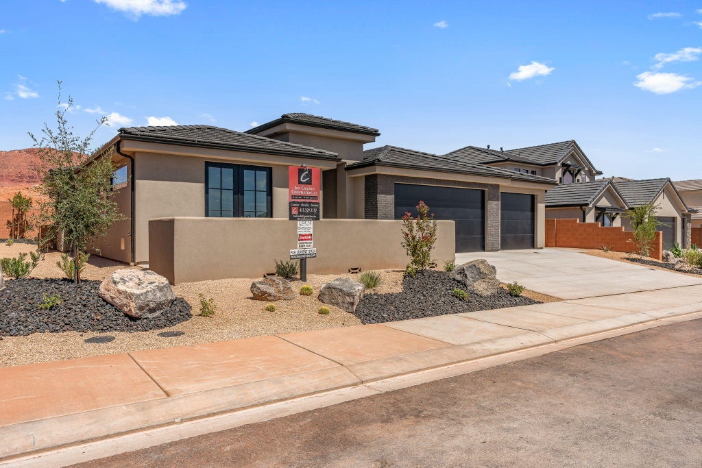 Photo of 49 E Morning Glory Ave, Ivins, UT 84738 (MLS # 26-275318)