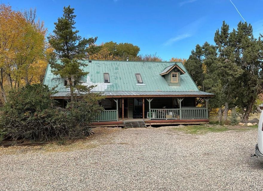 Rare opportunity to own a unique riverfront property on 1.33 acres, with the Santa Clara River flowing right through your backyard. Perfect for fishing, relaxing, and enjoying the peaceful sounds of nature every day.
This home offers stunning views of surrounding mountains and streams, along with a rear deck with a large hot tub. The property includes water rights, along with full utilities: on-grid power, water and natural gas.
Conveniently located just 20 miles from St. George, you'll enjoy both privacy and easy access to everyday amenities, as well as close proximity to off-road trails, fishing and State and National Parks.
The home is currently undergoing a remodel, with much of the demolition already completed, providing a great opportunity to customize the space to your vision. 
The kitchen has been recently updated with new cabinetry and thick, rough-cut quartz countertops. 
Basement level walks out with a river view. The home offers three levels of living space. 
Built with a solid concrete foundation, durable 2x6 framing, and a leak-free metal roof, the structure provides a strong foundation for your finishing touches.
Additional features include a detached metal garage and a large parking area with plenty of room for an RV, fifth wheel trailer, ATV's and other toys!