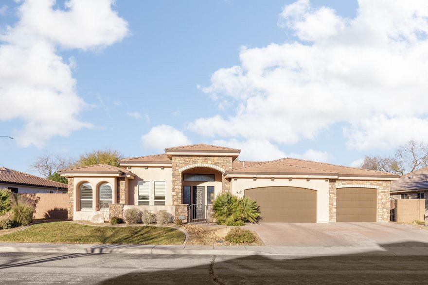 Experience this spacious 3-bedroom, 2-bath home with high end finishes. Wood-look tile flows throughout, delivering a cohesive, contemporary feel that's durable and easy to maintain. Outside, unwind in a xeriscaped backyard with tranquil fountains for year-round beauty and minimal upkeep. A three-car garage with epoxy flooring provides ample storage to handle all your gear, projects, and organization needs. If you desire upscale finishes, a low-maintenance yard, and generous space without compromising style, this is the home for you. Schedule your private tour today!