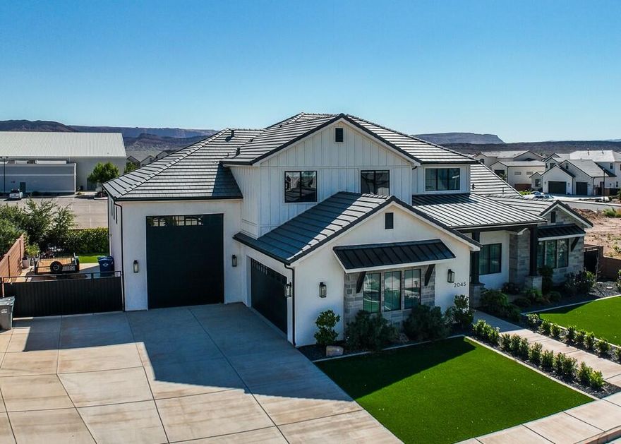 This like-new residence has everything you need in a highly sought-after location. It includes a spacious, oversized RV garage that is 40' deep w/220v and a 12'x15' door to accommodate RV, boat, shop or car enthusiasts. The chef's kitchen is equipped with top-of-the-line appliances and ample counter space, while the butler's pantry adds convenience and organization to your daily routine. Enjoy the stunning views of the iconic red rock landscape from multiple vantage points throughout the home. With a low-maintenance yard, you can spend more time savoring the beauty from your pergola out back and enjoy your surroundings and less time on upkeep. No HOA provides you with the freedom to personalize your space to your own liking.