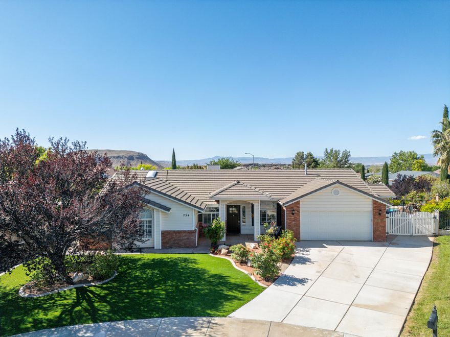 Updated single-level pool home in Spring Hill Estates, tucked at the end of a quiet cul-de-sac in Washington. This is an easy one-story layout with 4 bedrooms plus an office option, 2.5 baths, and about 2,462 sq ft on a flat, usable lot with a private pool and spa. 

Inside you'll find neutral colors, hard-surface counters, and a clean kitchen with stainless gas range, microwave, and dishwasher. The main living area has vaulted ceilings and a gas fireplace, with enough space for a real family room setup instead of just a ''formal'' room. The primary suite includes a separate tub and shower, walk-in closet, and good natural light.

Outside is where this one stands out. You get an in-ground gunite pool with attached spa,  and an exterior half bath so nobody has to drip through the house. The backyard is set up for everyday use, not just photos.

Practical stuff is already in place: attached two-car garage with custom cabinets, storage shed, auto sprinklers, and tile roof. No HOA, and you're close to schools, parks, and amenities in Washington City.

If you're looking for a single-level home with a private pool, a cul-de-sac location, and no HOA, this one should be on your list!