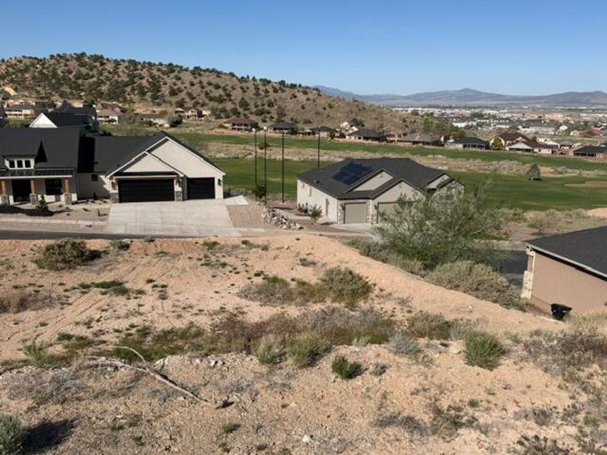 Wonderful building lot in highly sought after Canyon Ridge Subdivision.  Build your dream home today overlooking the beautiful golf course and enjoy those relaxing sunsets.  This vacant lot includes water, sewer and power.  There are not many lots left in this beautiful subdivision!  Buyer and Buyer's agent to verify all information.  No appointment needed.