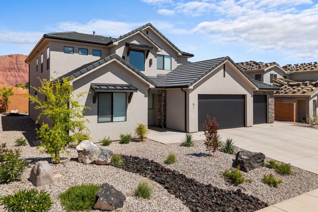 Photo of 61 E MORNING GLORY Ave, Ivins, UT 84738 (MLS # 26-271453)