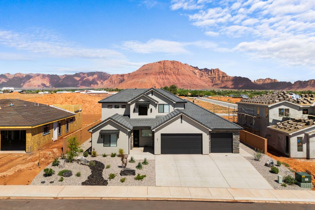 Photo of 61 E MORNING GLORY Ave, Ivins, UT 84738 (MLS # 26-271453)