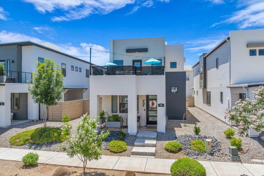 *HIGHLY MOTIVATED SELLERS* willing to contribute $2,500 towards Home Warranty and/or the HOA transfer fee. Beautifully upgraded home in the highly desirable Desert Color community. This 3 bed, 2.5 bath home features a spacious open-concept kitchen and living area with laminate hardwood flooring throughout the main level. The generous primary suite includes a private rooftop deck with misters with community views. Additional upgrades include epoxy garage flooring, a Level 2 two EV charger for fast and convenient vehicle charging, a reverse osmosis system, and a brand-new Kinetico water softener. Golf Cart community with close proximity to Desert Color amenities, this home is a perfect fit for those seeking an active lifestyle. Don't miss it!