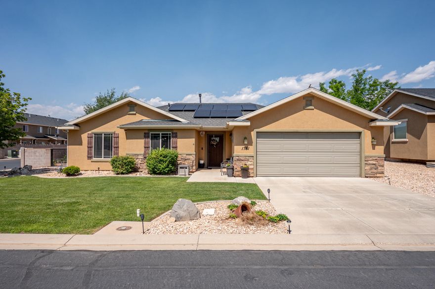 Welcome to this beautifully built & meticulously cared-for home in the desirable Sycamore Trail neighborhood. This home offers a fantastic floorplan designed for comfort & functionality. The kitchen is a standout with granite countertops, a walk-in pantry & plenty of space for cooking & gathering. You'll love the spacious great room featuring vaulted ceilings & a cozy corner fireplace—perfect for relaxing or entertaining. The master suite is a peaceful retreat with a coffered ceiling, a well-appointed master bathroom with dual vanities & exquisite, one-of-a-kind countertops in the bathrooms for a touch of unique elegance. Step outside to enjoy the cement walkway surrounding the home, a charming front porch & a large covered back patio ideal for outdoor living. Solar ads energy efficiency! The solar panels will be paid off at closing. The fully landscaped yard is enclosed with a block wall fence, offering privacy and low-maintenance beauty.
Don't miss your chance to own this stunning home in a wonderful community!