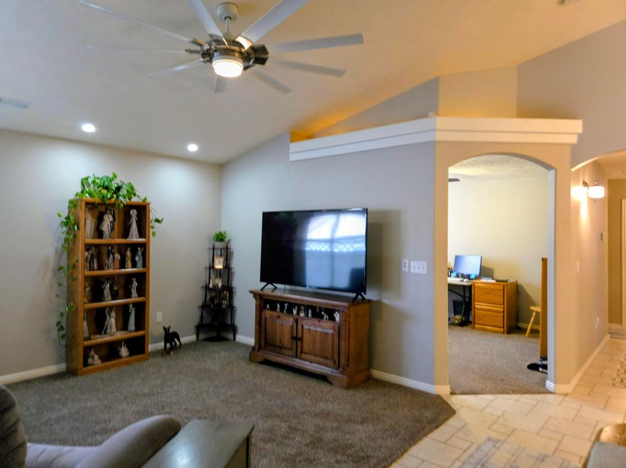 Additional RV Parking on site!  Come see this Spacious Home with 3 Bed Plus Gym/Utility Room, 2 bath home in a desirable 55+ community! Featuring a large, bright kitchen with plenty of natural light, this home also offers a versatile bonus room with its own outdoor entrance--perfect for a gym, craft room, or guest space. Enjoy the private covered patio, RV parking with hookups, and low-maintenance artificial turf. Added upgrades include NEW AC unit with warranty, New Walk in Shower, Lighting, epoxy garage flooring with built-in shelving, and storm doors. Fridge, washer, and dryer are included! With a low HOA and convenient location just minutes from local stores, hospital, and the interstate, this home combines comfort, function, and value.