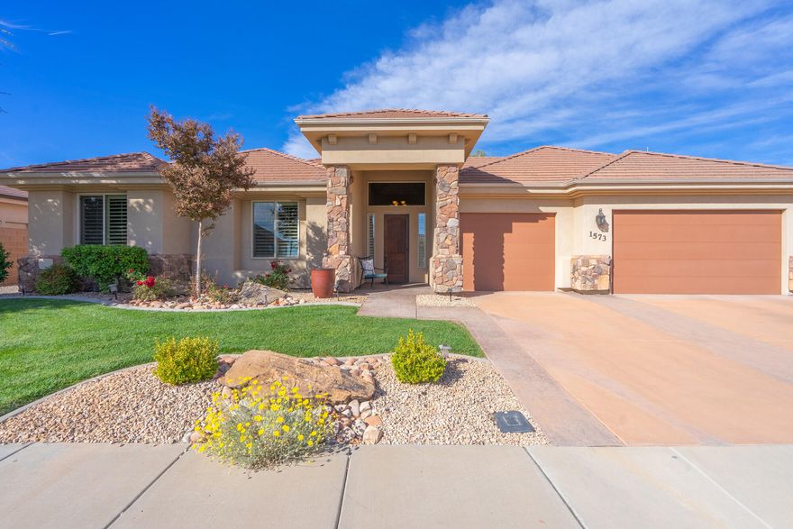 This beautifully designed home offers warmth, character and thoughtful functionality throughout. From the moment you step inside, you're welcomed by rich architectural details and well crafted interior rock accent walls that give the home a timeless Tuscany charm.  The solid construction and quality finishes create a sense of comfort and durability, while the versatile design could be easily transformed into a more traditional style if desired.  The kitchen is both inviting and practical, featuring solid cabinetry with ample storage and an extra large pantry that provides organizational space.  The open flow of the main living areas enhances the cozy yet spacious feel of the home.  The primary suite is a relaxing retreat, complete with a walk-through laundry area that leads directly into the private bath. The jacuzzi creates a perfect place to unwind at the end of the day. Step outside to a cozy backyard, thoughtfully landscaped for privacy.  Could easily add some water features to enhance the outdoor experience.  Easy to show.  Come take a look!  You won't be disappointed in this popular neighborhood of "Green Springs.  Golf course nearby, as well as restaurants, movie theaters, and shopping malls.