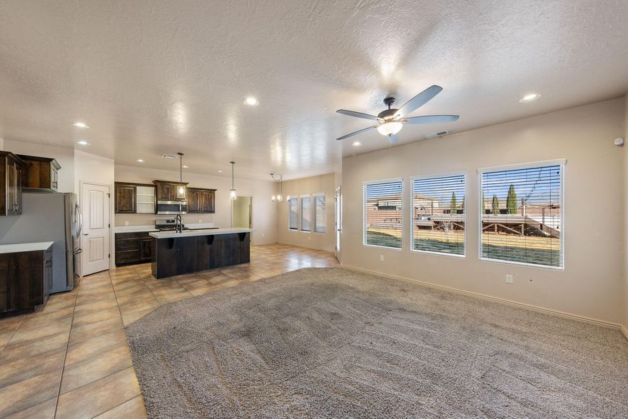 Great location in Little Valley in Desert Hills school district. Quartz counters, tile floors, open floor plan.  Master has jetted tub with a separate large walk-in shower.  Home also has a separate living room in the upstairs.
