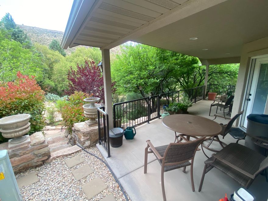 A very quiet & peaceful way to live your life.  Harrisberg, just minutes from St George, without the city noise & the traffic. Back yard feels like a private oasis.  Tree filled open space, shaded, private & cool. One bed rm and a lg bonus rm w/ murphy bed, desk and tread mill.  Stick built with 2X6 exterior, sky lights & many other quality up grades. Short walk to pool and clubhouse on the tree linedstreets. Oversized 2 car carport w beautiful outdoor lighting.