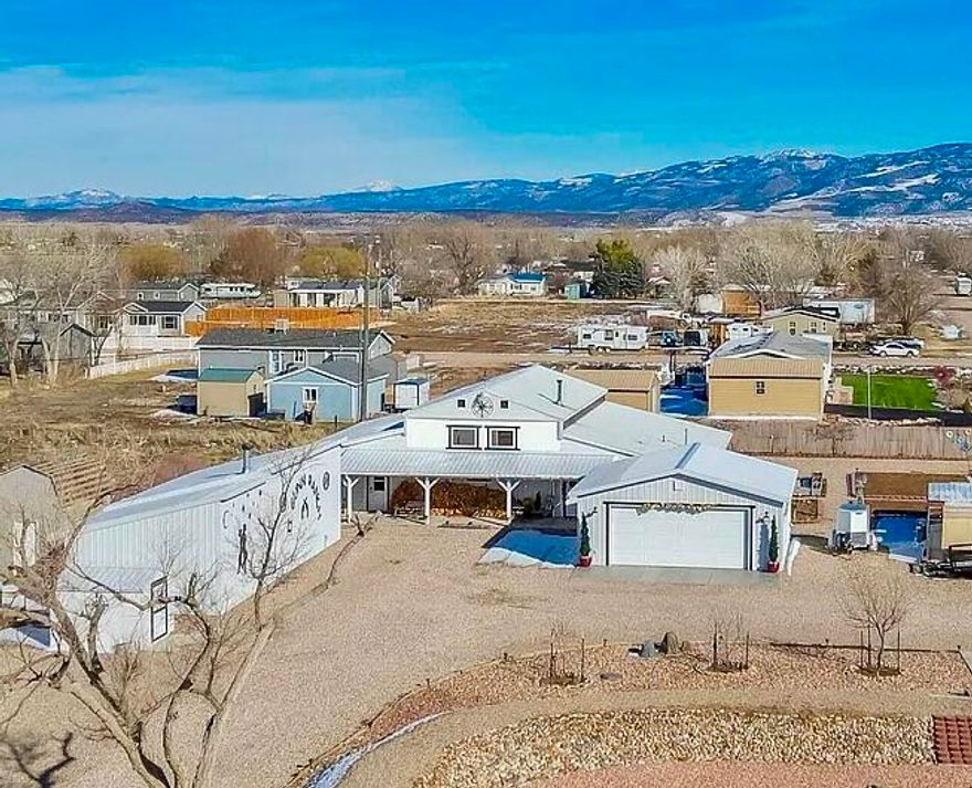 One-of-a-kind MINI RANCH BARNDOMINIUM with character, charm, and wide-open views on a .68-acre lot just minutes from Cedar City. Features an open-concept split floor plan with vaulted ceilings and a spacious kitchen with new flooring, stone countertops, and a large peninsula ideal for entertaining. The oversized primary suite includes two walk-in closets, a double steam shower, and dual vanities. Loft offers flexible office or den space with abundant storage, plus a 2-car garage and sheds. Enjoy a cozy front porch swing, garden area, fruit trees, and room for animals, toys, trailers, and RVs with two hookups. Includes 846 sq ft guest quarters/woodshop with wood stove, efficient 2x8 construction, foam insulation, commercial HVAC, fiber optic, well water, and dual septic.