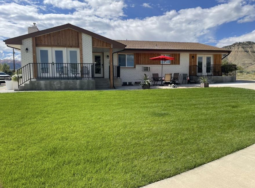 This impressive 8-bedroom, 7-bathroom property is a fantastic investment opportunity located just 3 miles from the wilderness entrance to Bryce Canyon National Park. From the Inn, you can enjoy views of Bryce Canyon and are only a scenic 2.5-mile hike to the lodge inside the park via the Tropic wilderness entrance. Originally built in 1979, the home has been completely remodeled with all-new windows and doors, updated plumbing and electrical, and brand-new flooring and paint throughout. The property is being sold fully furnished, making it truly turnkey and ready to operate immediately as a successful nightly rental. Known as the Bryce Canyon Country Inn, it is already established on Booking.com and Expedia with excellent reviews. Situated on a spacious .95-acre lot, nearly an acre, with a .50 share of irrigation water, the property offers incredible flexibility, including the potential to build an additional home and live on-site while continuing nightly rentals. The grounds feature a charming orchard with mature apple, peach, apricot, cherry, and plum trees, along with a new 20' x 20' concrete pad ideal for a future two-car garage. Located in the quaint and welcoming town of Tropic, surrounded by multiple state parks and scenic Highway 12, this is an exceptional opportunity for a retirement income property and a place to create lasting memories near one of Utah's most iconic national parks. Buyer to verify all information, deemed reliable, however buyer to verify all info including utilities, rental restrictions, and HOA information if applicable.