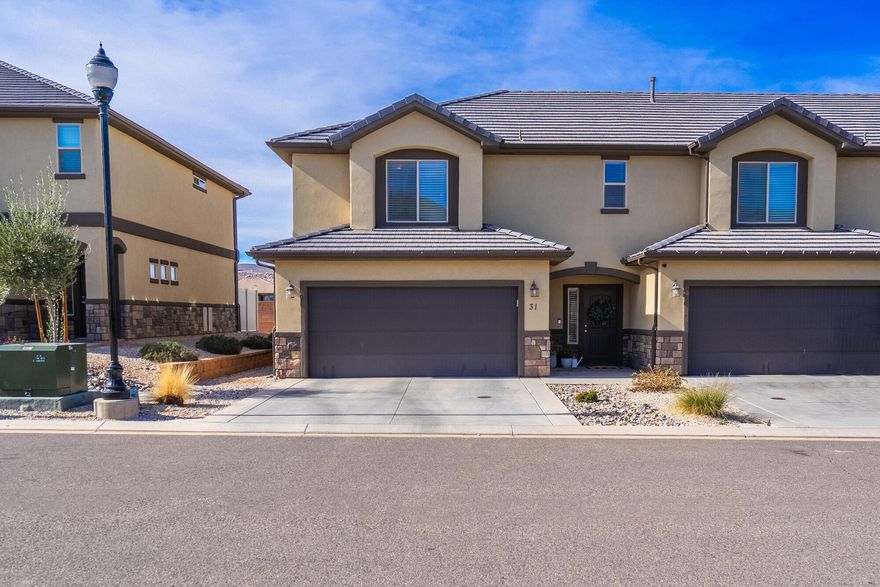 This move-in ready single-level home features a spacious and practical open floor plan, ideal for daily living and entertaining. You'll appreciate the convenience of modern appliances and a layout designed for comfort. Step outside to a private patio space. The community offers a refreshing pool and scenic walking trails for leisure. A significant advantage for buyers: the preferred lender is providing a $3,000 credit to be used at closing. A wonderful opportunity in a great St. George location.