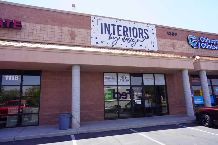 Roll up door in back, high ceilings, nice store front.