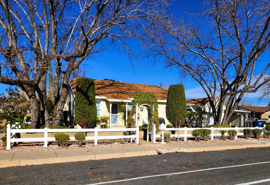 Welcome to this charming, move-in-ready home that blends timeless character with fresh modern updates, all just minutes from downtown St. George.

From the moment you arrive, the cheerful   exterior and thoughtfully landscaped yard set the tone, inviting, warm, and full of personality. The lot offers extra space to enjoy outdoor living, gardening, or future possibilities.  With No HOA.
Inside, the home has been freshly renovated and fully repainted, creating a cozy, welcoming atmosphere that instantly feels like home. Natural light, warm finishes, and efficient use of space make the interior feel both comfortable and functional.

The main house features two bedrooms and one full bath within 832 square feet, perfectly suited to anyone who appreciates character and simplicity. A standout feature is the separate carriage house, thoughtfully converted into a charming guest retreat with a sleeping area and living space. Whether used as a guest retreat or grandkids' house, it adds flexibility and value, bringing the total living space to over 1,000 square feet.

This property offers rare charm, versatility, and proximity to downtown, all in one delightful package. Ideal as a primary residence, second home, or investment opportunity, this is a special place ready for its next chapter.