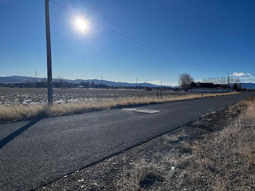 Build your dream home on this exceptional 1-acre lot in the sought-after Amaral Ranch Subdivision in Beaver. The property is fully fenced and showcases breathtaking panoramic views of surrounding mountains and the open valley below. Enjoy wide-open skies, peaceful rural surroundings, and the beauty of nature in every direction as well as the conveniences of downtown. The lot includes valuable water shares - one share of Harris Willis water and one share of Kent's Lake water as well as existing utility hookups, making it truly build-ready. A rare opportunity for scenic living with convenience.