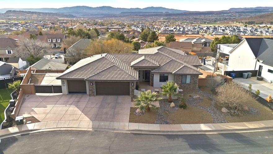 The perfect place to call home!  Featuring stunning views through massive windows, gourmet kitchen, walk out basement, beautiful pool with waterfall, pickleball court, lots of patio space, game room, exercise room, 6 bedrooms, huge storage space, outdoor shower and excellent location in a quiet-no HOA neighborhood.
The absolute perfect family home!