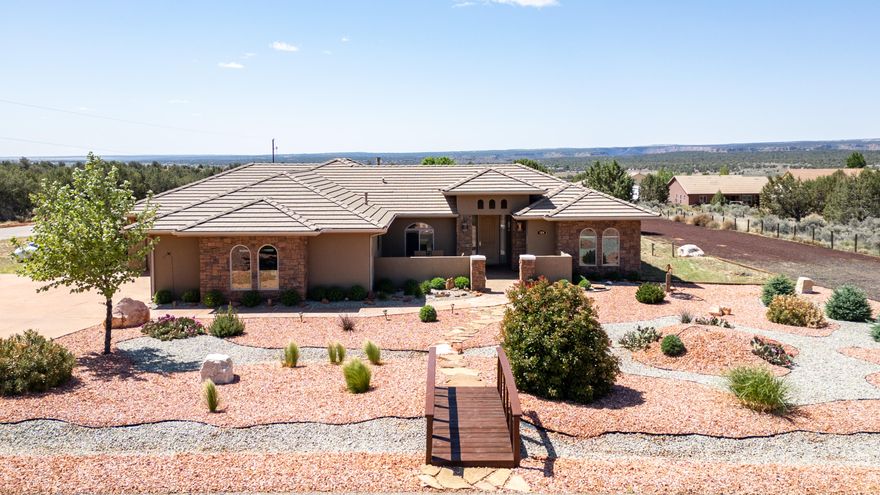 Welcome to easy living in this charming 4-bedroom, 2-bath single-family home nestled on a spacious corner lot in the heart of Apple Valley, Utah. Surrounded by stunning red rock views and set on early an acre this home offers the perfect blend of comfort, space, and tranquility. With a thoughtful no-step entry design, this home is ideal for anyone seeking single-level living in a quiet, slower-paced community. You'll love the expansive RV parking area, complete with water and power hookups-perfect for guests, toys, or your own desert getaway setup. Whether you're soaking in the scenic surroundings, enjoying the peaceful lifestyle, or simply relaxing on your property under clear skies, this home is rare find in one of southern Utah's most serene settings. No HOA, no hassle-just freedom and fresh air.
