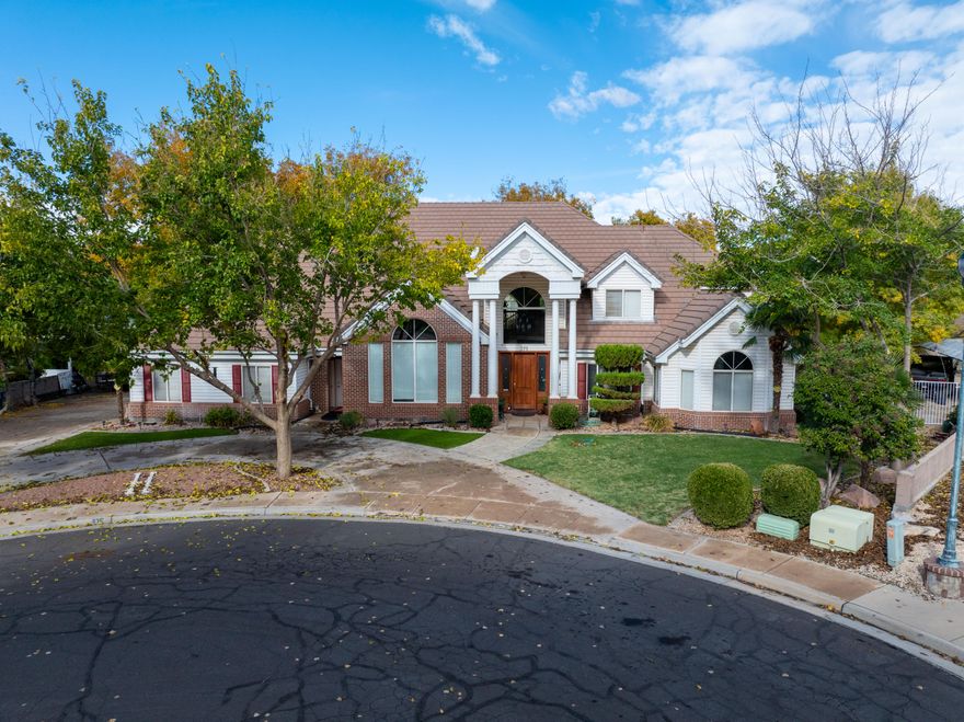 This is a home where location, livability, and lasting quality come together. Private, practical, and full of character, it is a place that simply feels right the moment you arrive.
The home itself is rich in classic charm, highlighted by stately white pillars, enduring brick architecture, and warm wood details that never go out of style. Inside, the layout offers exceptional flexibility with abundant storage throughout, dedicated office space, hobby rooms, and a generous playroom perfect for kids or grandkids. Whether you work from home, entertain, or enjoy hands on projects, this home adapts beautifully to every stage of life.
Tucked away at the end of a quiet cul de sac, this timeless brick home delivers the rare combination of privacy, character, and everyday convenience. With Gould ...With Goulds Wash just across the street, the setting feels peaceful and secluded, yet you are minutes from grocery stores, schools, churches, restaurants, the post office, UPS, and downtown. You get the benefit of being close to everything, without the traffic or noise, and surrounded by neighbors people genuinely love.