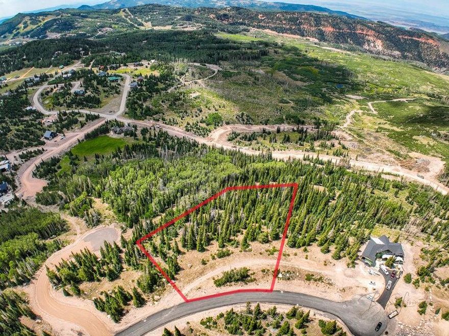 Welcome to your dream mountain escape! This 1.59 acre lot is located in a beautiful ski resort and offers breathtaking views. Imagine waking up to the sight of towering pine trees and lovely aspens all around you. At over 10,000 feet elevation, you'll feel like you're on top of the world. The lot is perfect for building your dream cabin or vacation home. Enjoy fresh mountain air, peaceful surroundings, and endless outdoor adventures. In winter, hit the slopes right from your doorstep. In summer, hike, bike or simply relax and take in the stunning scenery. Don't miss out on this unique opportunity to own a piece of paradise. Whether you're looking for a weekend getaway or a place to build lasting memories, this lot has it all. Contact us today to learn more. Your Adventure Awaits!