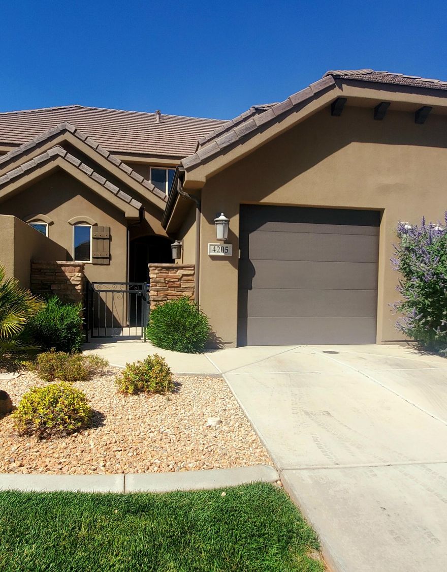 Discover this well-appointed 4-bedroom, 3-bath home, offered fully furnished and approved for short-term rental use . The property features a functional, open layout with generous gathering spaces, excellent natural light, and comfortable bedroom separation. Located near Coral Canyon Golf Course and within convenient distance to multiple outdoor recreation areas—including Sand Hollow Reservoir, Sand Hollow Resort, the Sand Dunes, and Zion National Park—this home provides exceptional access to Southern Utah's most popular amenities.
Residents and guests can enjoy a range of community features, including two pools, a hot tub, playground, and a stocked fishing pond. Offered turnkey and ready for immediate use, this property is suited for personal enjoyment, rental use, or  combination.