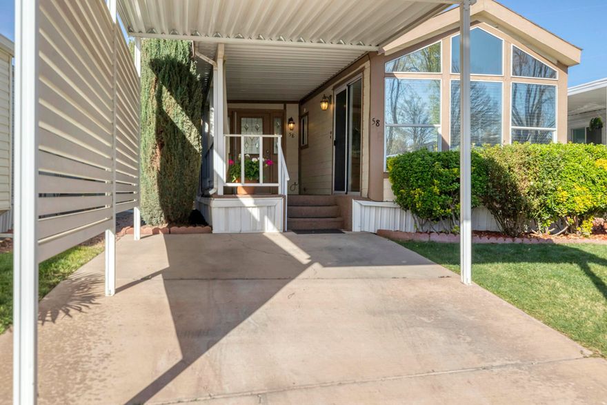 Charming 1 bed, 1 bath home that has been exceptionally well cared for, plus an additional room perfect for a guest room, den, or office. Major updates already done for you, including a newer heat pump/AC, roof, and water heater. Enjoy relaxing on the lovely back patio or unwind on the spacious front porch during cool evenings. Located in Rio Virgin Estates, a desirable 55+ community ideally situated along the Virgin River and walking/biking trail.