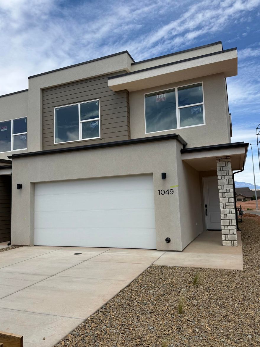 **END UNIT** Welcome to the Luna, a brand new 3-bedroom townhome with a spacious loft in one of Southern Utah's most sought-after new communities in Washington, Utah. This modern home features a stylish kitchen perfect for everyday living and entertainment. Upstairs offers a private primary suite, two additional bedrooms, full bath, and a flexible loft ideal for a home office or media space. Enjoy low-maintenance living, energy-efficient construction, convenient access to Warner Valley and Zion Shores Surf Park!