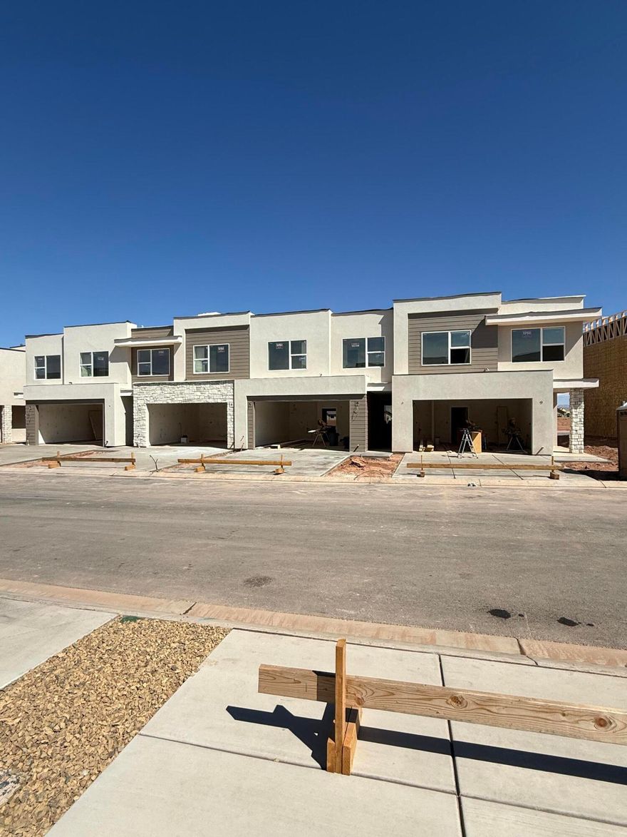 **END UNIT** Welcome to the Luna, a brand new 3-bedroom townhome with a spacious loft in one of Southern Utah's most sought-after new communities in Washington, Utah. This modern home features a stylish kitchen perfect for everyday living and entertainment. Upstairs offers a private primary suite, two additional bedrooms, full bath, and a flexible loft ideal for a home office or media space. Enjoy low-maintenance living, energy-efficient construction, convenient access to Warner Valley and Zion Shores Surf Park!