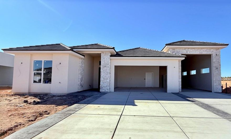 S&S Homes at Riverbend! This home sits on a lot that backs to the Virgin River with no homes behind. This home feartures 4br 3ba 3 car boat garage, pool, 12' ceilings in main living areas, multi slider in living room, soft close cabinets, large walk in pantry, LVP in main living areas, tiled tubs and showers, front and backyard landscaping included.