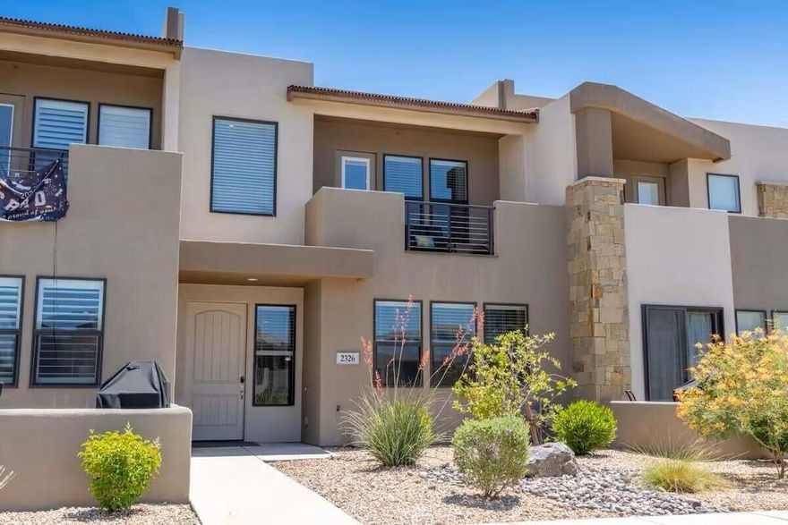 Capitalize on a 100% approved short-term rental asset in the Town Center at Coral Canyon. This turnkey townhome is sold fully furnished with an established track record of past and returning guests. The floor plan features a primary suite on the main level, spacious living areas, and a two-story layout optimized for guest capacity. An upstairs outdoor balcony provides a dedicated sitting area for guests to take in the surrounding landscape. Situated 30 minutes from Zion National Park and 15 minutes from downtown St. George, the location provides immediate access to regional golf, water sports, and hiking. Community amenities include an on-site swimming pool, hot tub, and pickleball courts. Come and take a look and book your showing today.