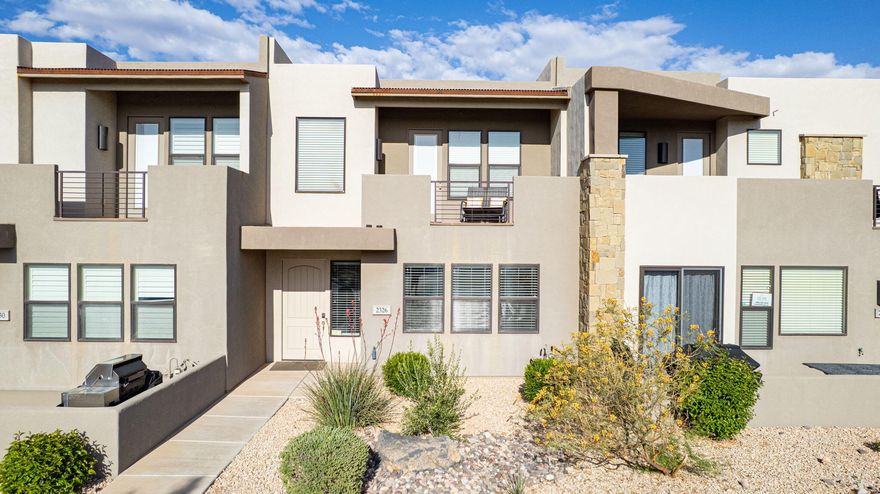 Capitalize on a 100% approved short-term rental asset in the Town Center at Coral Canyon. This turnkey townhome is sold fully furnished with an established track record of past and returning guests. The floor plan features a primary suite on the main level, spacious living areas, and a two-story layout optimized for guest capacity. An upstairs outdoor balcony provides a dedicated sitting area for guests to take in the surrounding landscape. Situated 30 minutes from Zion National Park and 15 minutes from downtown St. George, the location provides immediate access to regional golf, water sports, and hiking. Community amenities include an on-site swimming pool, hot tub, and pickleball courts. Come and take a look and book your showing today.