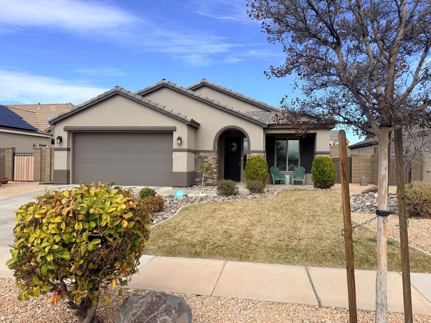 Wonderful home in Highland Park @ Coral Canyon.  Recently the flooring was updated to LVP and new carpets & pad. Great room has extra high vaulted ceilings and custom built in cabinet.  4 bedrooms and a private den / office.  Extra kitchen  counter space and laundry / mudroom with bench and hooks.  The sellers extended the already oversized patio with additional concrete to give plenty of outdoor living space on the NE side of the home for amazing shade most of the day.  The large backyard is big enough for a future pool, etc.