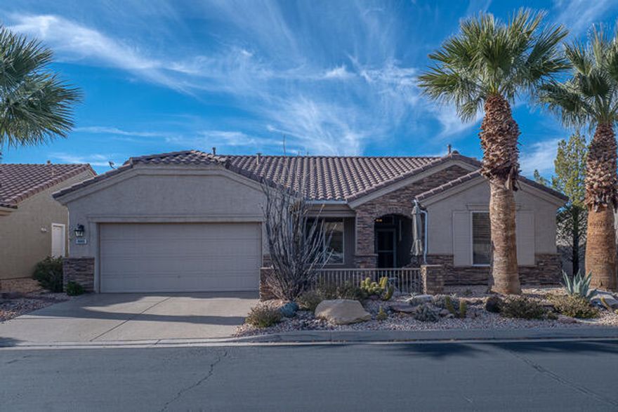 This elegant home in Sun River, a 55+ community, has so many wonderful features!  Starting with the front courtyard, you'll enter to find high ceilings, skylights, plantation shutters throughout the home, a gas fireplace, new carpet & paint (in 2023), storm doors, a water softener, reverse osmosis, and then a beautiful back yard that has a custom waterfall, a built-in bbq and mini refrigerator, gutter screens, and a sun room with ceiling fan and a/c and automatic sun shades.  The sun room square footage is approximately 100 sf and is not included in the main square footage of the home.  Minimal yard maintenance!  The Sun River community has so much to offer:  a clubhouse with a weight room, indoor pool, fitness room, poolside grill, ballroom, multi-purpose room, outdoor pool, library, pool room (for playing pool), computer room (for classes), sewing room, and arts and crafts room.  There are dance classes and fitness classes as well.  There are plays and entertainment and bus trips to Las Vegas, the wineries, and outdoor concerts (some of these extras have additional fees that are reasonable).  Agent is related to seller.  The home is easy to show - please call any time.  Thank you!  =)