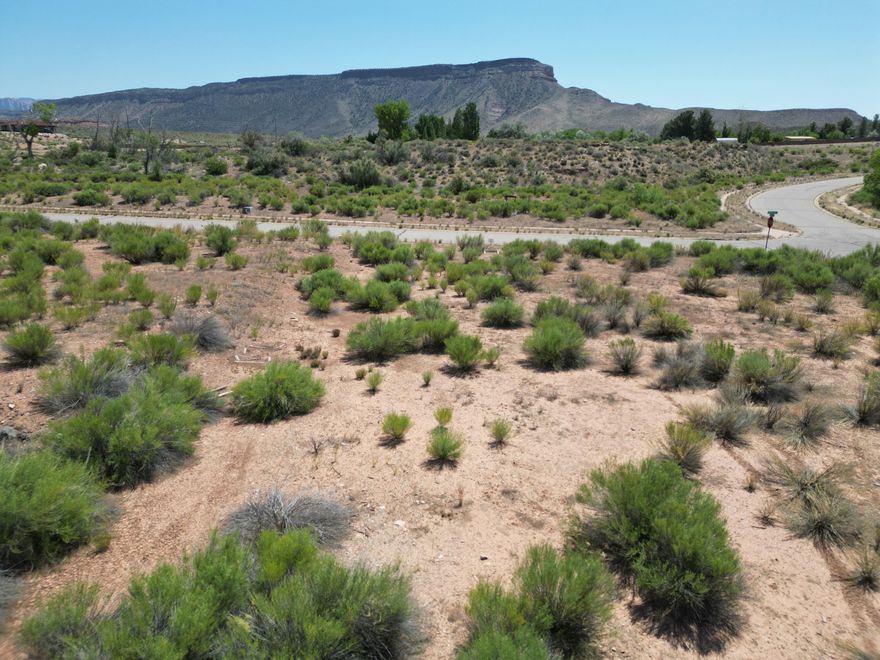 New Phase Release Premium 1 plus acre lots now selling from our brand new sales office at Sierra Bella in Virgin Utah. Just minutes from the gates of Zion National Park. This is your opportunity to own a slice of Southern Utah Paradise! These fully improved lots offer sweeping views of the iconic Zion Mesas and a rare rural residential setting perfect for your custom dream home. With approved builders ready to go, you can start building right away. Each lots includes one share of pressurized irrigation water in addition to the culinary tap. ACT NOW prices start at $235,000.00 Washington County Water Conservancy Impact Fees have been paid on al lots. All information deemed reliable buyer .... buyer to verify.