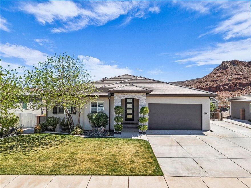 Motivated sellers! View lot with no HOA, panoramic backyard views, and a fully separate basement apartment that rented for $1,850/month.

The main level features a bright, open floor plan with 9-foot ceilings, quartz countertops, custom built-ins in the office and living room, custom window coverings, and abundant natural light. The main residence includes 3 bedrooms, 2 baths, an office, a second living room/playroom in the basement (wired for a future theater room), and a dedicated storage room. The upstairs is fully furnished, and all furniture is included with the sale.

The basement also houses a self-contained 2 bed / 2 bath accessory apartment with a full kitchen, private master suite, living room, and its own laundry room. It's currently sealed off from the main home for full privacy, but the connection can be reopened anytime. Ideal for multigenerational living, guests, or continued rental income!

Upgrades and systems include filtered drinking water, a whole-home soft water system, dual AC units, dual water heaters, and the entire home pre-wired for speakers. Both refrigerators and both washer/dryer sets included with the sale.

Outside, the entertainer's backyard delivers panoramic views, an in-ground trampoline, and a yard hydrant for easy watering. A gas line is already run for a future pool or hot tub. RV parking on-site.

Desert Canyons sits minutes from the St. George Regional Airport and 7-8 minutes via the Southern Parkway to I-15, putting the new Costco at Desert Color, Smith's Marketplace, the new Megaplex movie theater, and a growing lineup of restaurants and retail right at your doorstep.

Square footage figures are provided as a courtesy estimate only. Buyer is advised to obtain an independent measurement.

***Basement pictures to be added shortly!