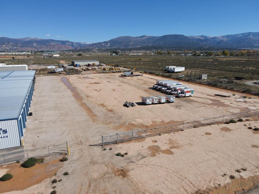 2 acres of secure parking available for LEASE ONLY. Property is fenced, has a gate code for access, and is conveniently located off HWY 56 and Iron Springs Road. If you are looking for a place to park your equipment, vehicles or trailers, this is a great and secure option.