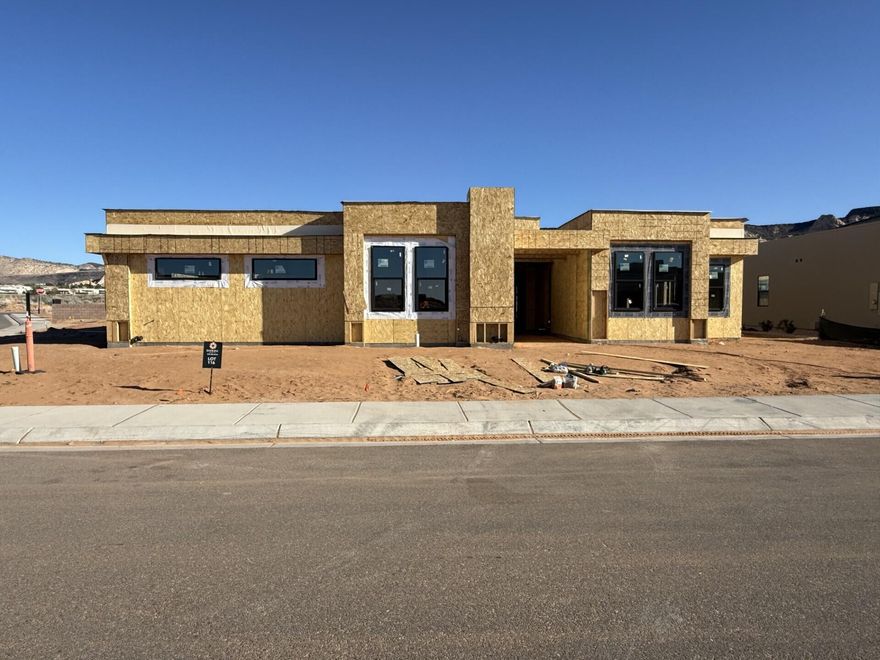 This Fairways community home is under Construction- 4-bedroom, 4.5 bath, 3 car garage, 3016 sq ft.  Beautifully designed for nightly rentals, each bedroom includes a private bathroom, offering ideal comfort and privacy for guests.  The layout is perfect for entertaining.  Quality finishes throughout and seamless indoor/outdoor living.  Located near the beautiful Ledges golf course and Snow Canyon State park.  Amenities include pool, hot tub, pickleball courts and fitness center.