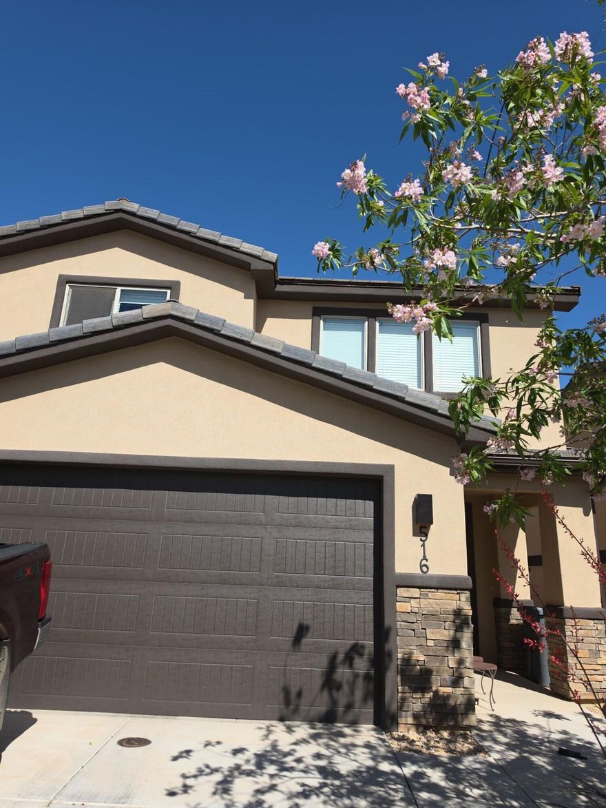 This 3-bedroom, 2.5-bath home offers a practical two-story layout with a 2-car garage and low-maintenance living. The main level features an open living, dining, and kitchen area designed for functionality and everyday use. Upstairs, all bedrooms are thoughtfully positioned, including a primary suite with an attached bath and ample closet space. Plus a convenient half bath on the main level. Situated in a convenient Hurricane location with access to local amenities, schools, and outdoor recreation. Move in available June 1, 2026. Deposit: $1,900 - Rent is $1,900. Owner pays HOA dues, Tenant pays for utilites.
