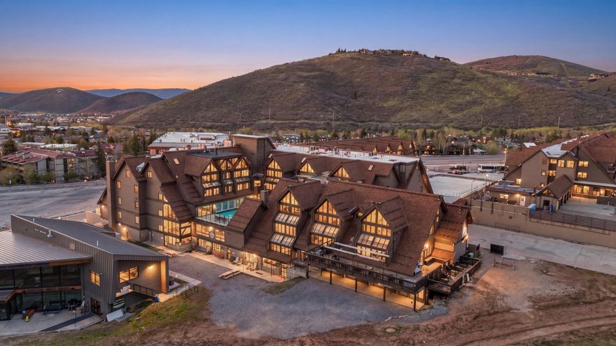 Located in the heart of Park City Mountain Village, this fully furnished and turn-key Resort Center condo offers an incredible opportunity to own at the base of Park City Mountain. With two bedrooms, two full bathrooms and 964 square feet, the residence is thoughtfully designed for comfort, convenience and year-round enjoyment.  The inviting great room is filled with natural light and features mountain-inspired finishes, a cozy fireplace and comfortable gathering space after a day on the slopes. The condo can sleep up to six guests and includes forced air, A/C, fresh new paint and a stackable washer and dryer for added convenience. Two hall storage units*, provide additional space for skis, snowboards, gear and personal items.  Step outside and enjoy exceptional ski access, with the ability to ski out to First Time, 3 Kings or Eagle chair lifts and ski back in with a short walk to the unit. Resort Center places you directly among the energy of Park City Mountain Village, surrounded by restaurants, shopping, ski shops and gear rentals.  Owners and guests enjoy access to Resort Center amenities, including a gym, year-round heated pool and hot tub, along with one unassigned underground parking space. Ideally positioned near Old Town and just minutes from Main Street dining, shopping and entertainment, this property is equally appealing as a vacation home, second residence or investment property. Nightly and long-term rentals are allowed, with the option to use your own property manager.  From winter ice skating and world-class skiing to summer activities including the Mountain Coaster, Alpine Slide, ZipRider™, mini golf, climbing wall and mountain biking, this condo offers four-season Park City living in one of the area's most desirable resort locations.