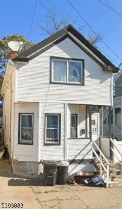 Photo of 112 Sheridan Ave, Paterson, NJ 07502 (MLS # 3994943)